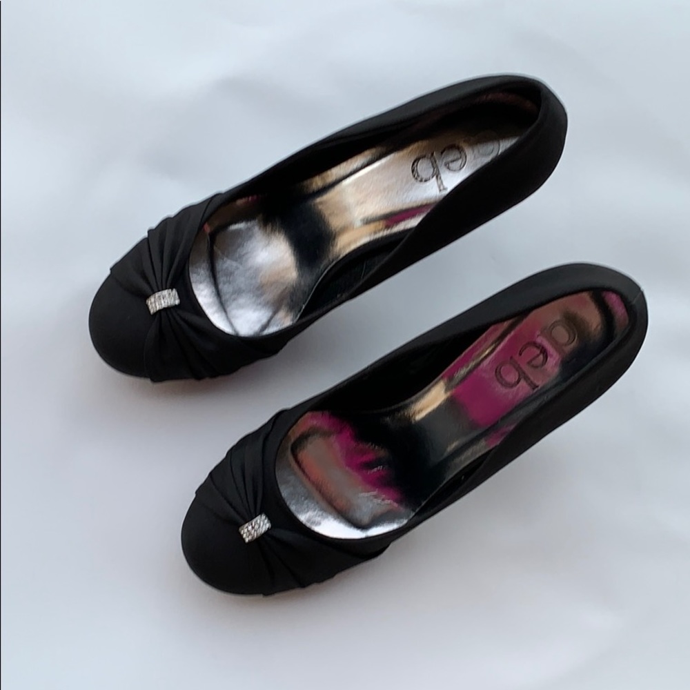 Black jewel bow pumps